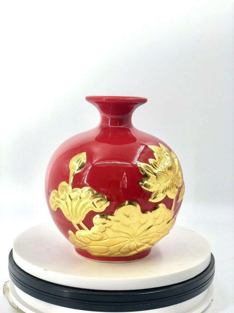 Giới thiệu về bình hút tài lộc đắp nổi sen vàng Giới thiệu về bình hút tài lộc đắp nổi sen vàng